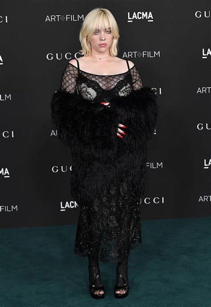 Billie Eilish Rocks Wet Sheer Black Dress For New Perfume: Photos – Hollywood Life