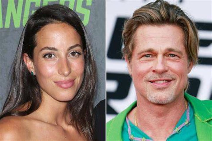 Brad Pitt’s GF Ines de Ramon Is All Smiles As She Leaves Work With Flower Bouquet On Valentine’s Day