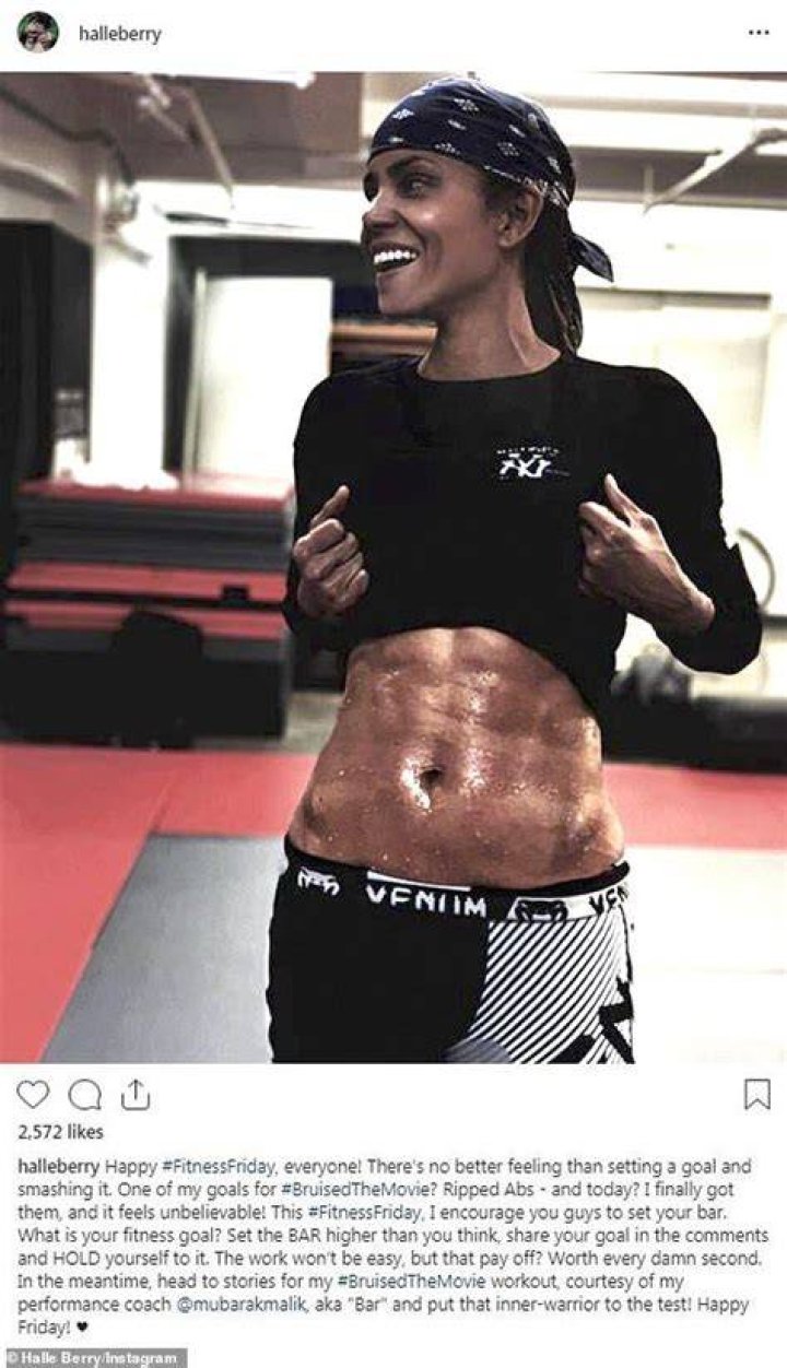 Halle Berry, 53, Reveals Insanely Toned Arms & Back While Showing Off Flexibility In Sports Bra