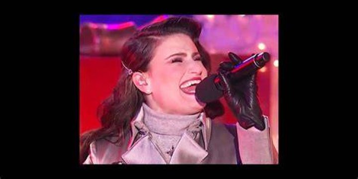 Idina Menzel Belts Out ‘Holly Jolly Christmas’ At Tree Lighting Event