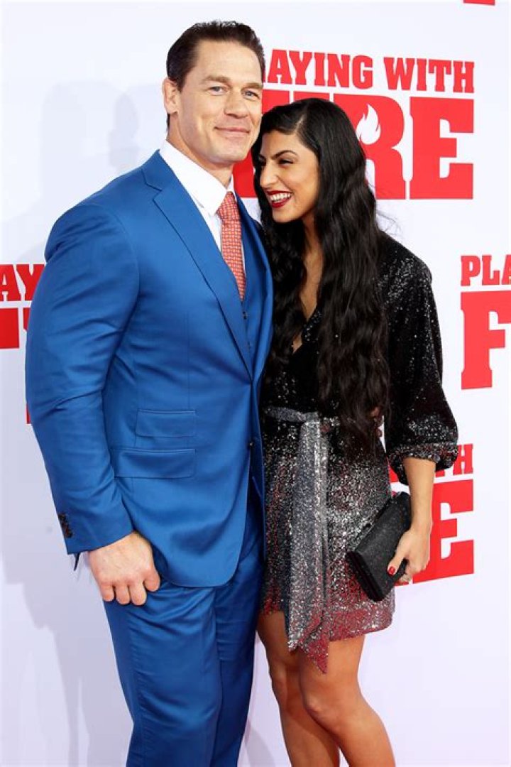 John Cena Is A Doting Husband Carrying Wife Shay Shariatzadeh’s Bags Through Airport — Photos