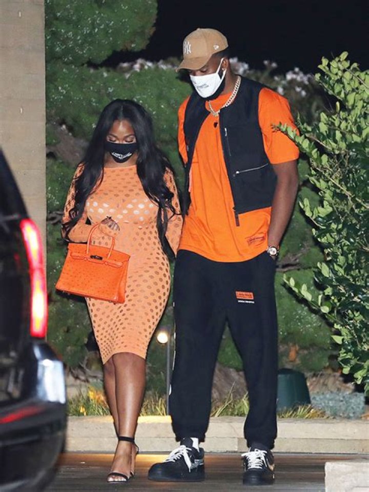 Jordyn Woods & Karl-Anthony Towns Match In Orange Outfits For New Nobu Date Night — Pics