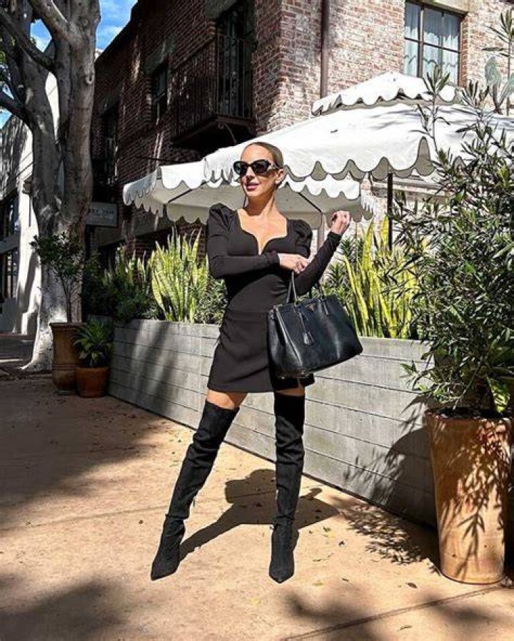 Khloe Kardashian Slays In Strapless Black Leather Mini & Over-The-Knee Boots – Photos