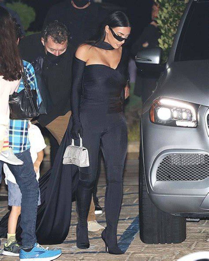 Kim Kardashian Rocks Skintight Black Jumpsuit With Long Cape: Pics – Hollywood Life