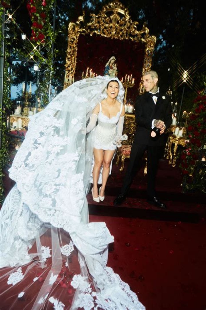 Kourtney Kardashian Lies In Bed Of Rose Petals In New Engagement Pics – Hollywood Life