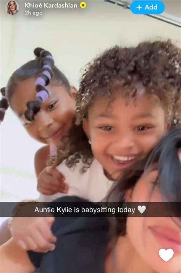 Kylie Jenner’s Daughter Stormi, 5, & Niece True, 5, Jump All Over Her in Hilarious Video: ‘My Back Hurts’