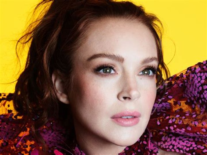 Lindsay Lohan Rocks A Pink Cover-Up While Lounging On A Hammock In The Maldives