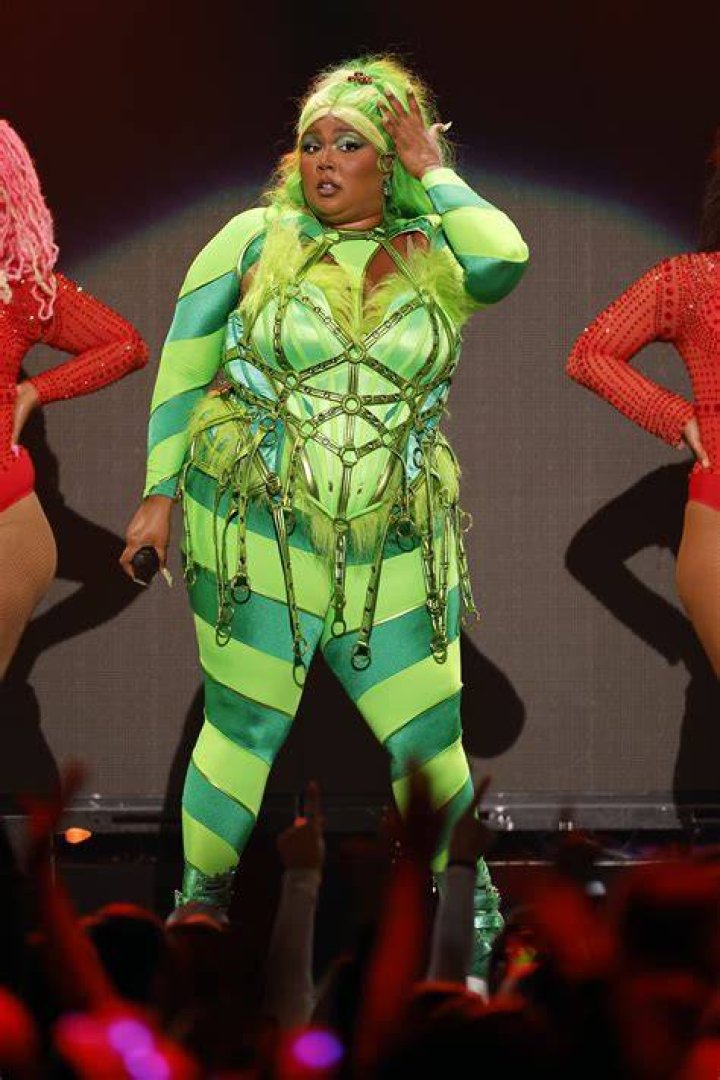 Lizzo Looks Sensational In A Snakeskin Swimsuit In New Backyard Photoshoot: See Pics