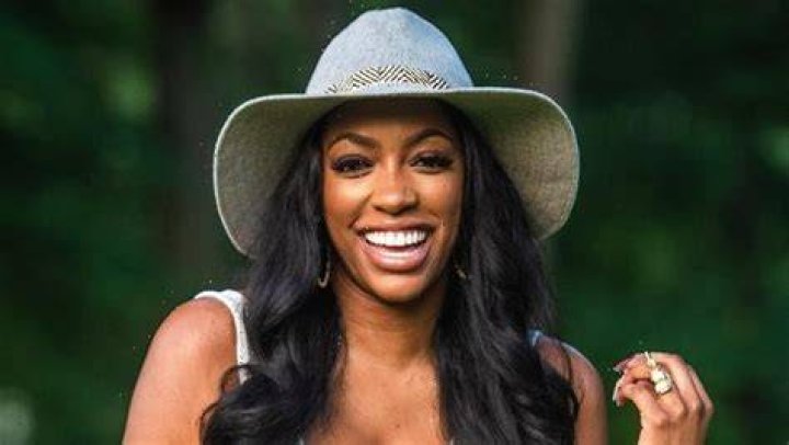 Porsha Williams Stuns In Bright Orange Bikini While Vacationing With Fiancé Simon Guobadia