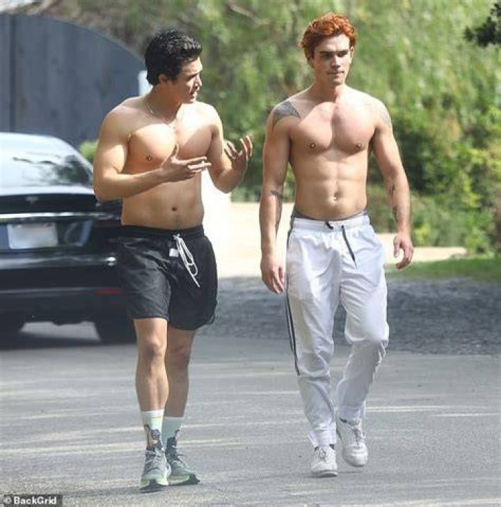 ‘Riverdale’ Star Charles Melton Shares Sexy Pic & Mark Consuelos Asks Him If He’s Using A Kylie Jenner Lip Kit