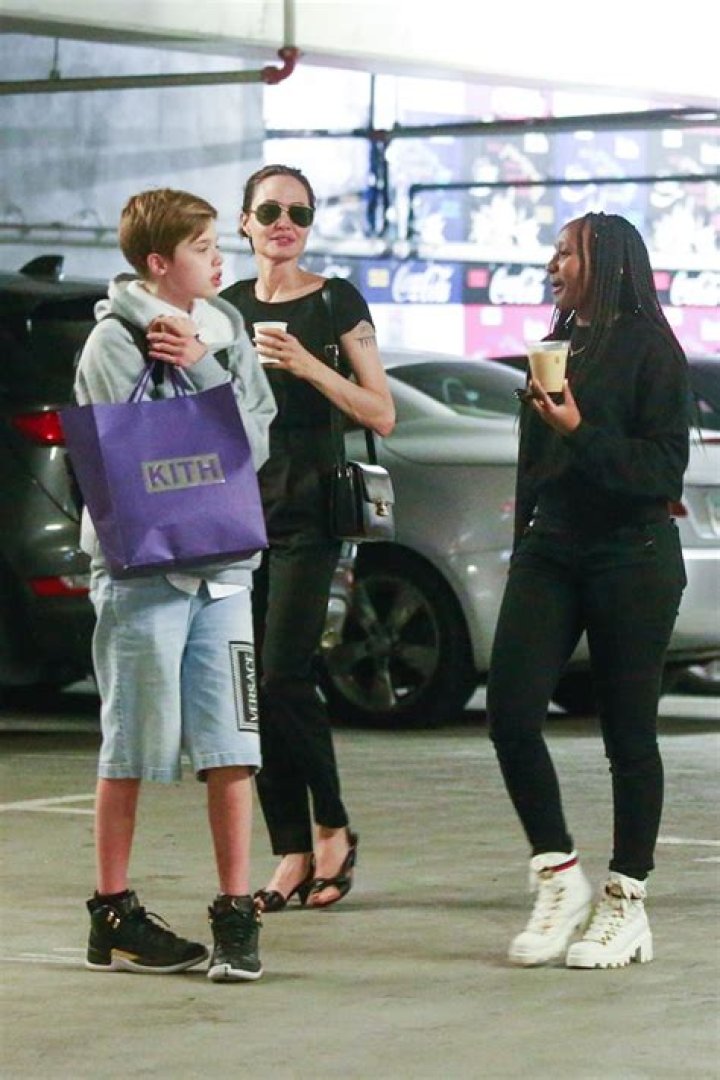 Shiloh Jolie-Pitt Rocks Shorts While Shopping With Mom Angelina & Siblings In London — Photos