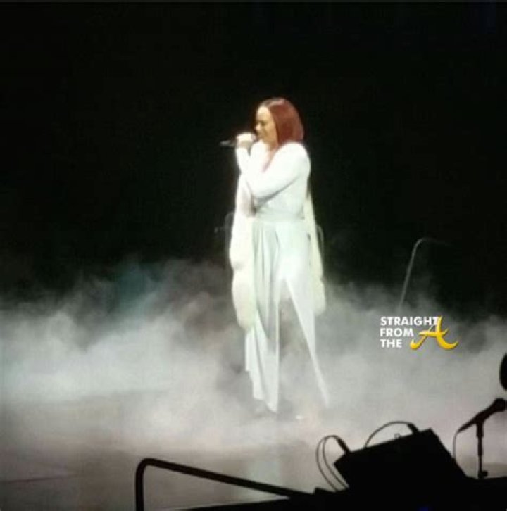 Stevie J Rushes Onstage To Fix Faith Evans’ Wardrobe Malfunction While She Performs