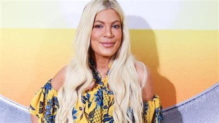 Tori Spelling Reveals She Was Hospitalized After Experiencing ‘A Hard Time Breathing’: Photo