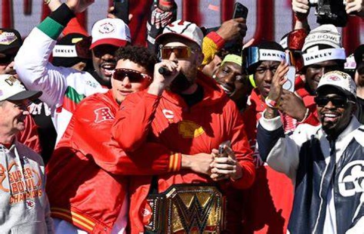 Travis Kelce Sports Huge Wrestling Belt at Chiefs Parade as Taylor Swift Heads to Australia